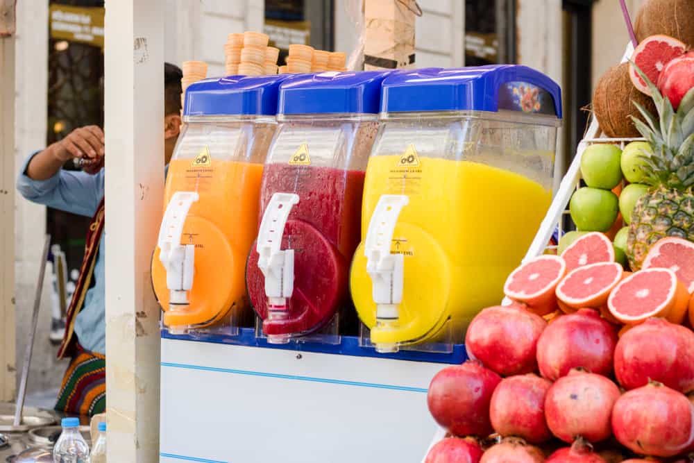 Juice,Machine,Of,Different,Varieties.,Hand,Cut,Pomegranate,And,Green