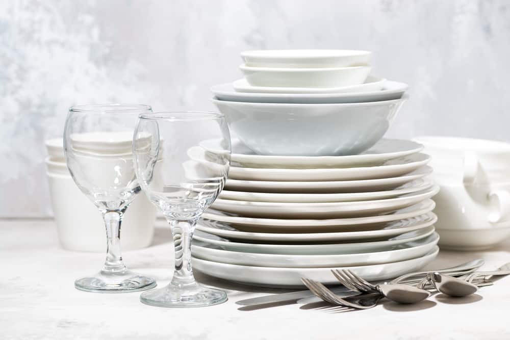Empty,Tableware,,Cutlery,And,Glasses,On,A,White,Background,,Horizontal