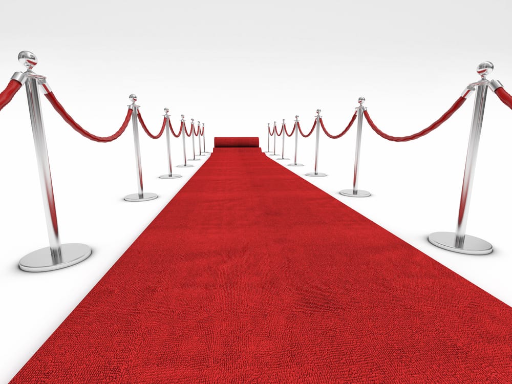 Red,Carpet,And,Barrier,Rope,On,White